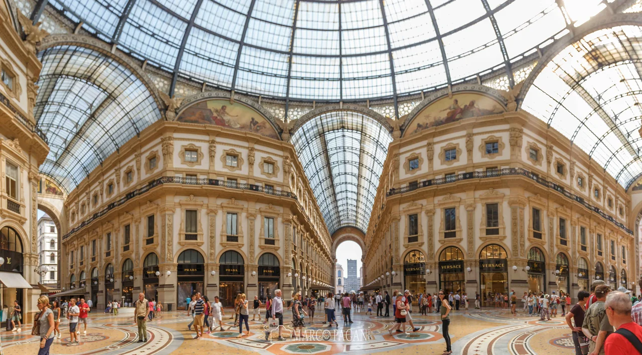 500px provided description: A sample of 4 photos taken in Milan last summer. Amazing site, where you can smell all history of this site. [#city ,#people ,#contrast ,#light ,#italy ,#architecture ,#building ,#panorama ,#indoor ,#colorful ,#historic ,#Milan]